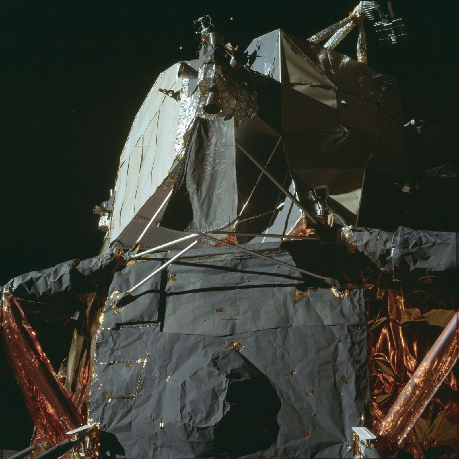 Close-up of the Lunar Module Eagle — descent and ascent stages — on the surface at Tranquility Base (AS11-40-5922, NASA).